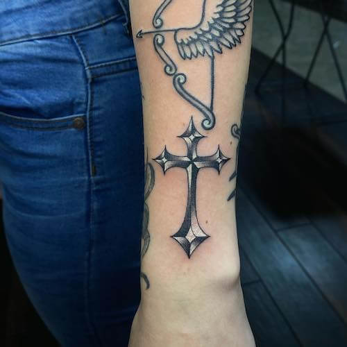 cross tattoos women