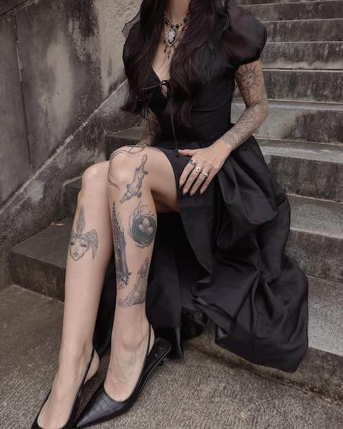 dark feminine tattoo