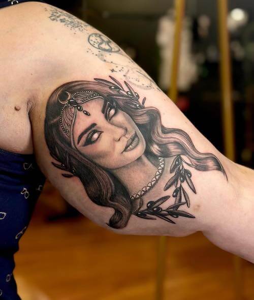dark feminine tattoo