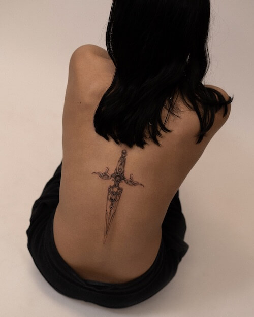 dark feminine tattoo