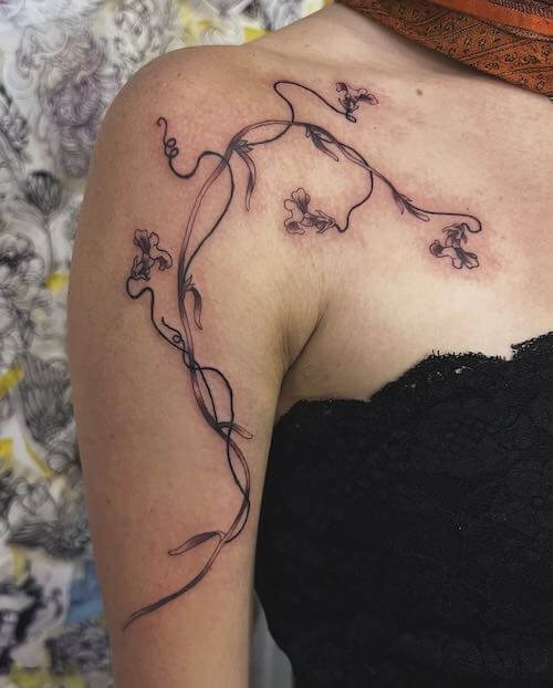 dark feminine tattoo