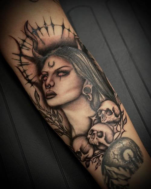 dark feminine tattoo