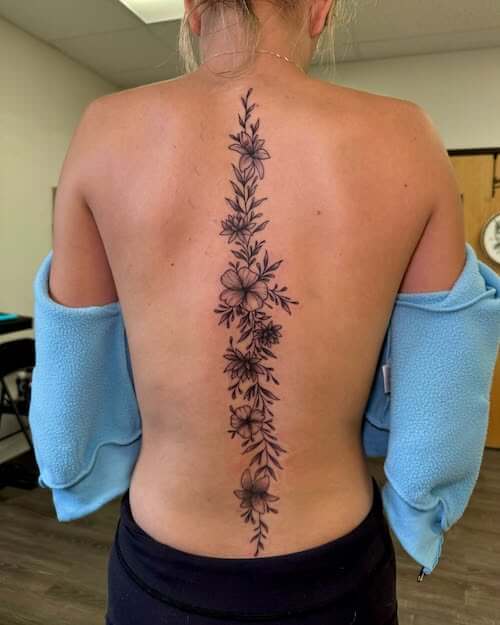 dark feminine tattoo