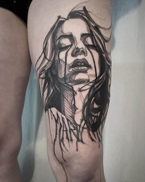 thigh tattoo for women
