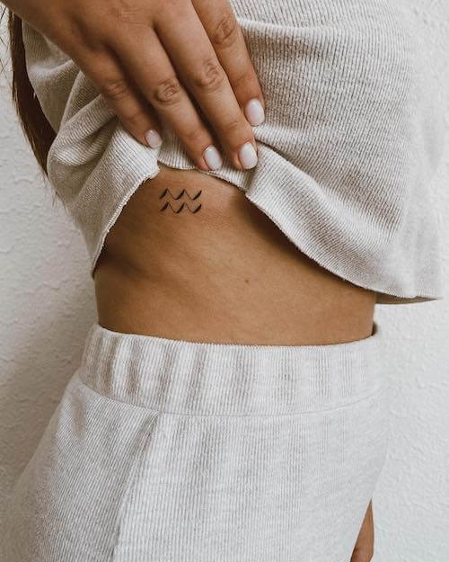 Aquarius tattoos for women