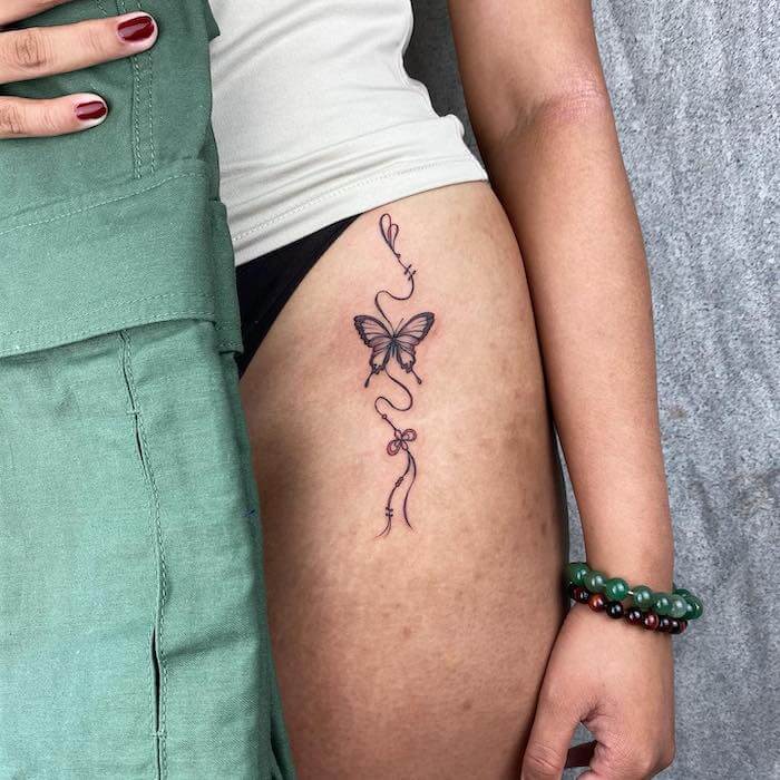 small butterfly tattoo women
