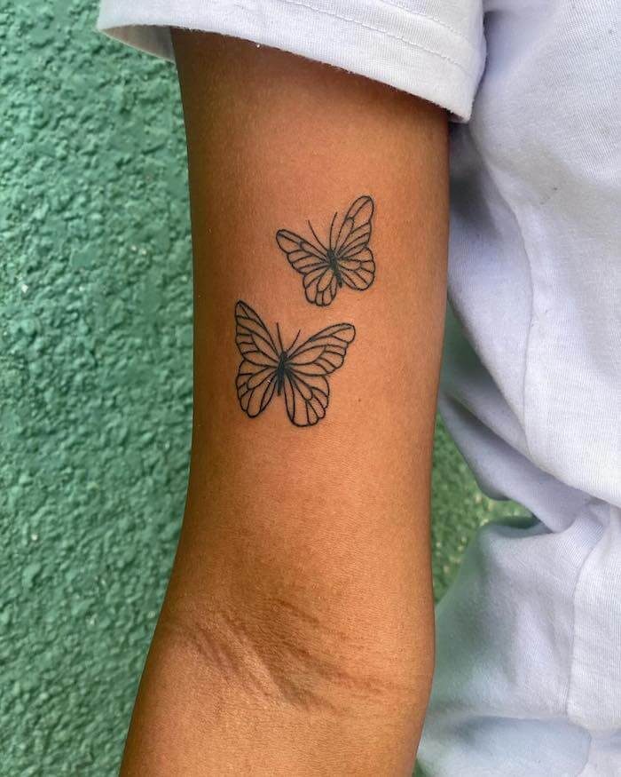 small butterfly tattoo women