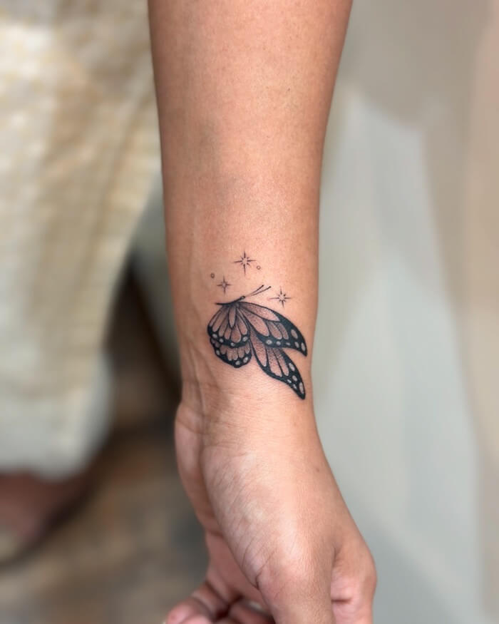 small butterfly tattoo women