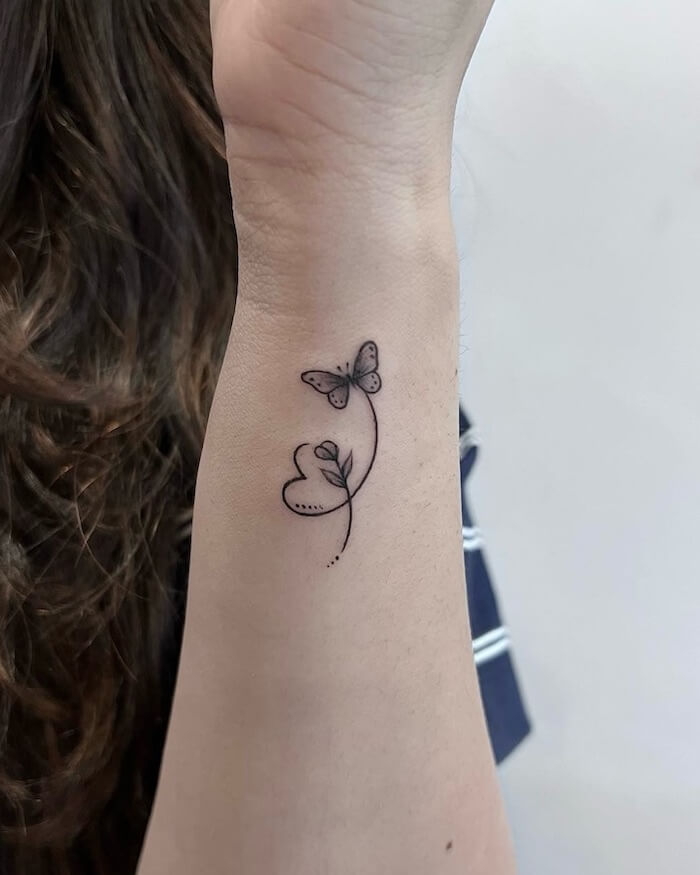 small butterfly tattoo women