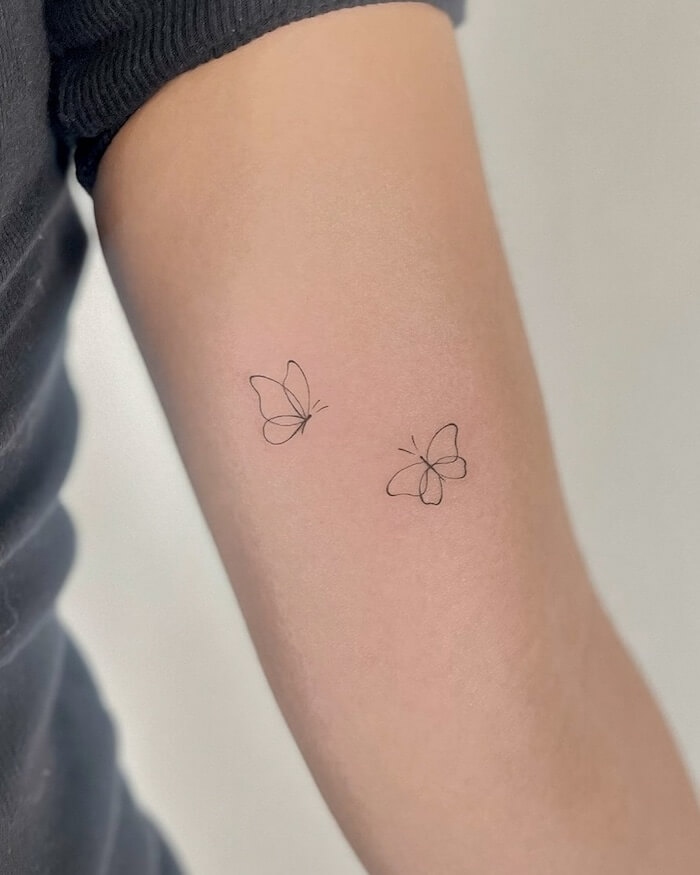 small butterfly tattoo women
