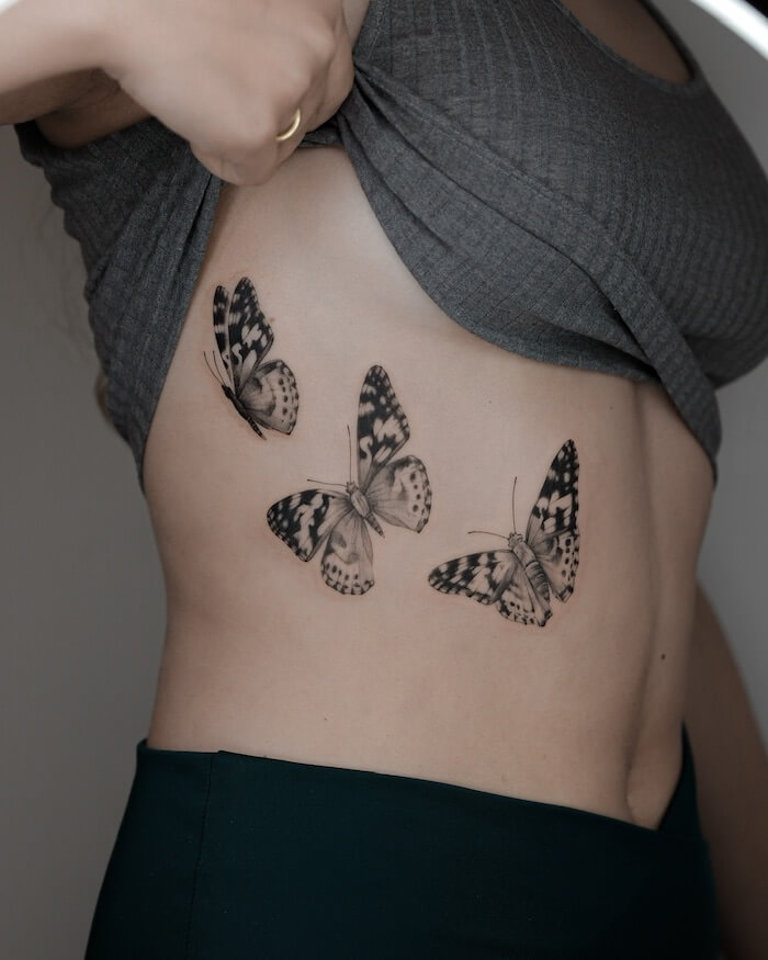 small butterfly tattoo women