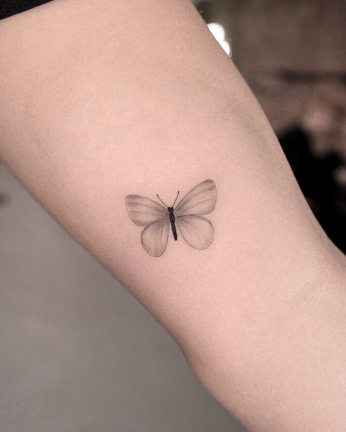 small butterfly tattoo women