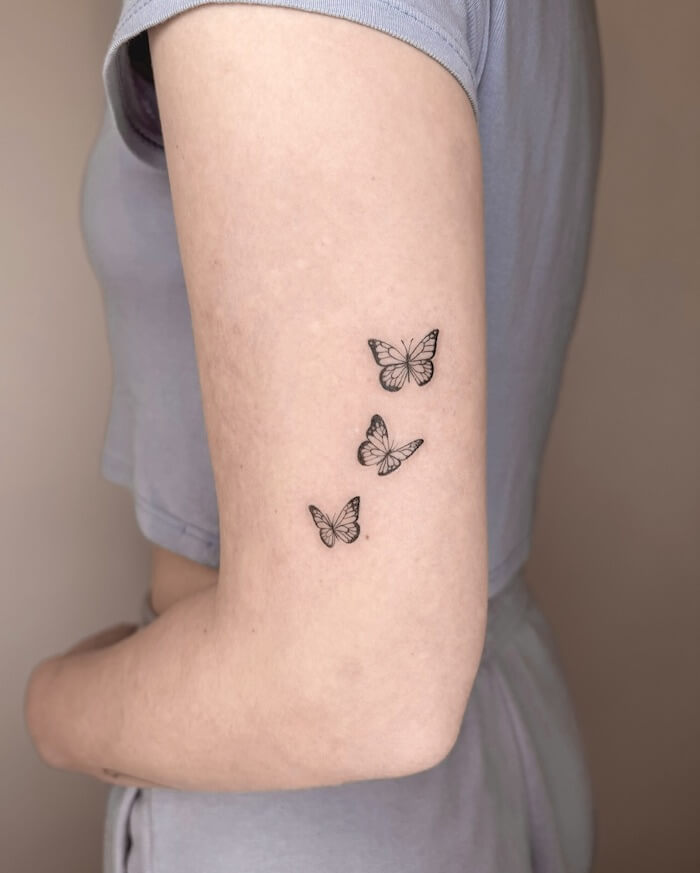 small butterfly tattoo women