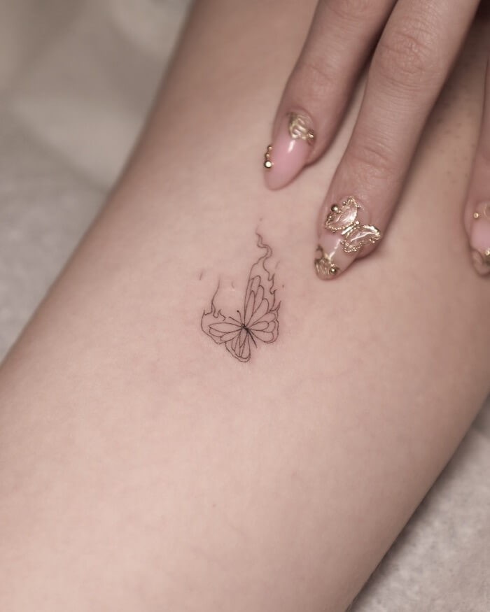 small butterfly tattoo women