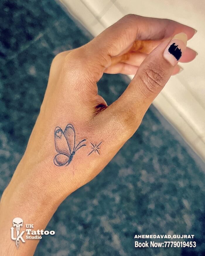 small butterfly tattoo women