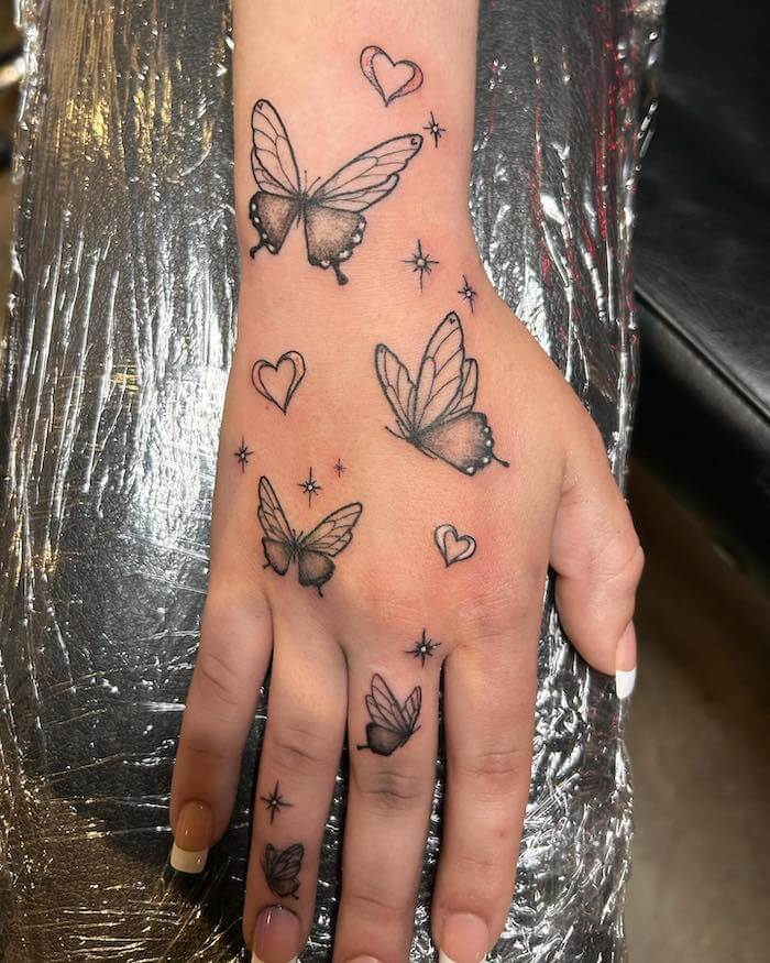 small butterfly tattoo women