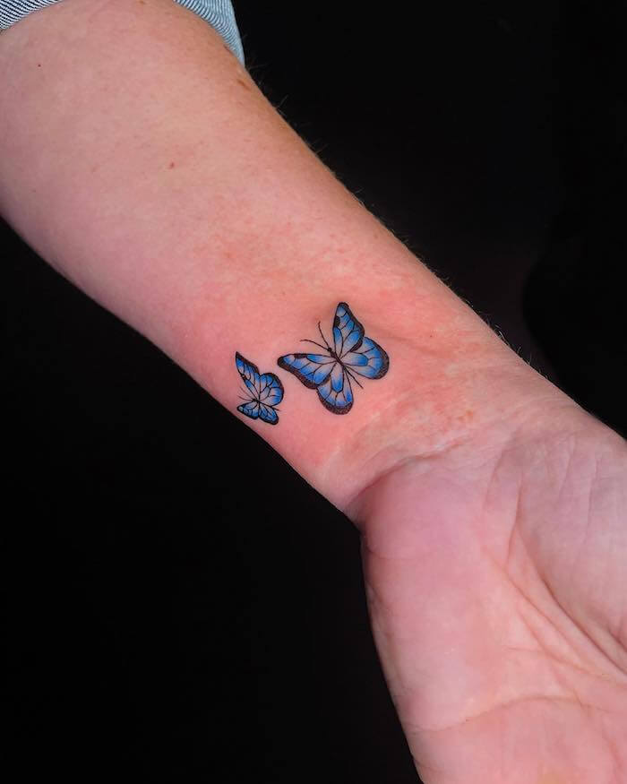 small butterfly tattoo women