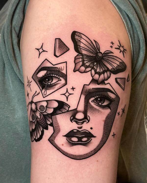 Butterfly And Face Tattoo