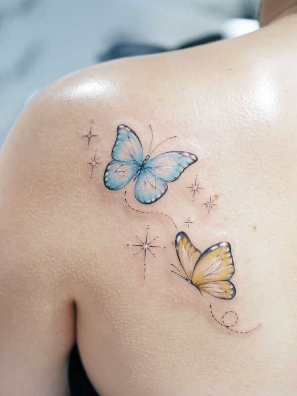 Shoulder And Back Blue And Yellow Butterfly Tattoo