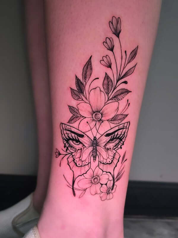 Butterfly And Vibrant Floral Thigh Tattoo