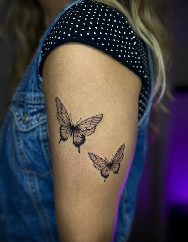 Two Butterflies Classic Tattoo On Upper Arm