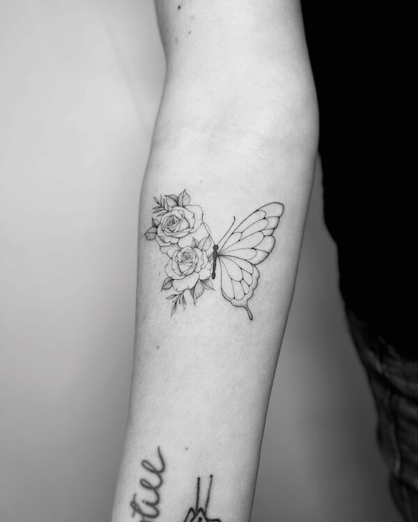Upper Arm Butterfly And Floral Combination Tattoo