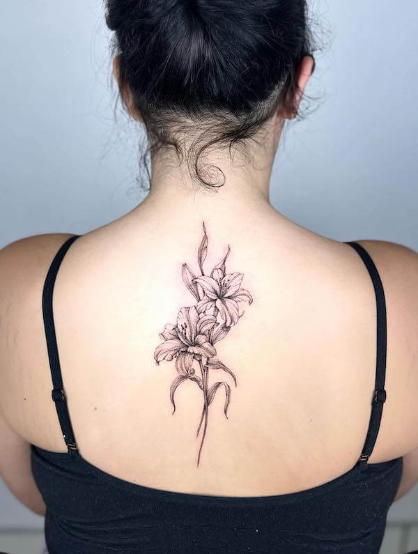 Romantic Lily Floral Spine Tattoo