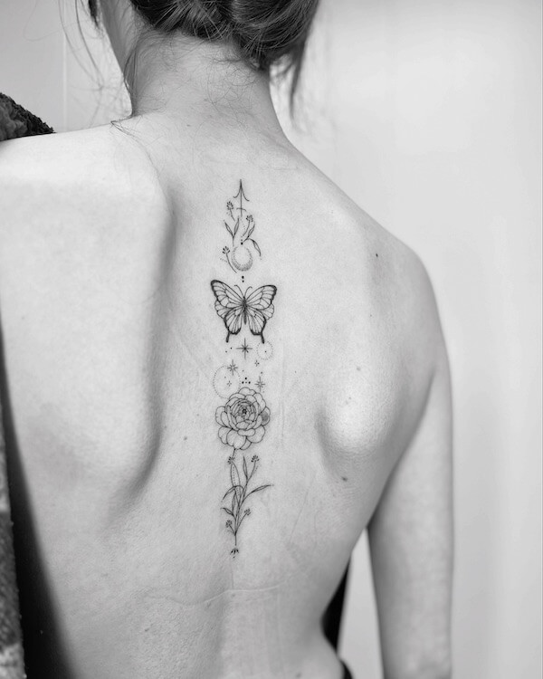 Butterfly Flower Star And Moon Spine Tattoo