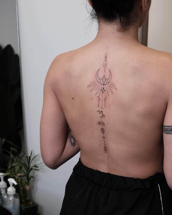 Lotus And Moon Spine Tattoo