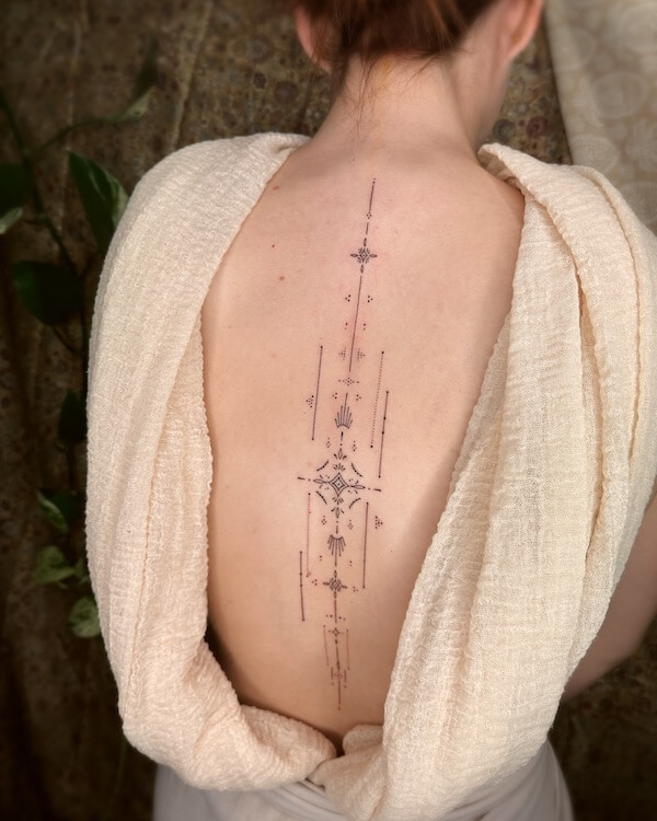 Unique Mandela Spine Tattoo