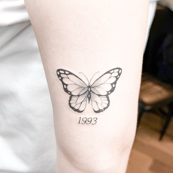 Butterfly And Year Tattoo