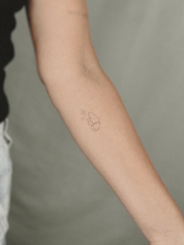 Minimalist Butterfly Forearm Tattoo