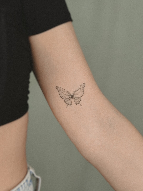 Upper Arm Small Black And Gray Butterfly Tattoo