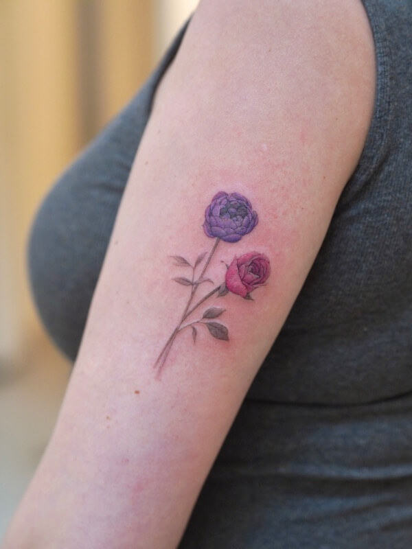 Upper Arm Blue And Red Rose Tattoo