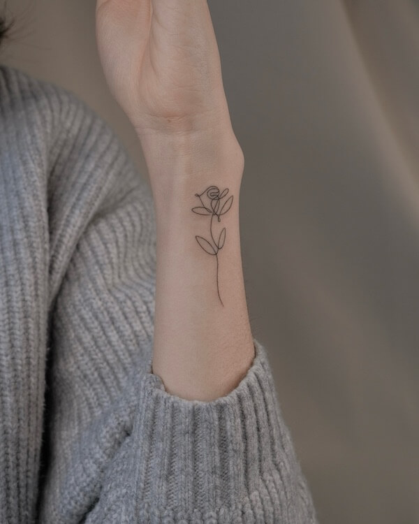 Delicate Rose Wrist Tattoo