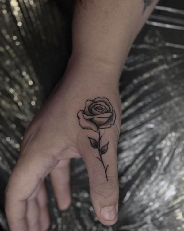 Thumb Rose Tattoo