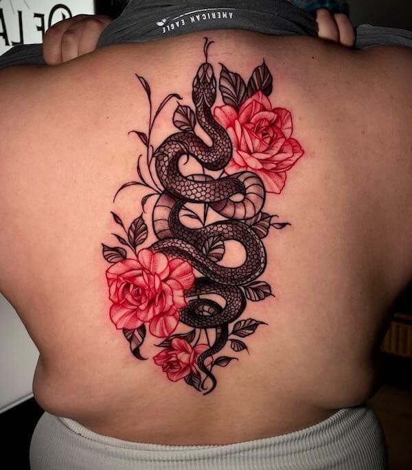 Black Snake And Red Floral Spine Tattoo